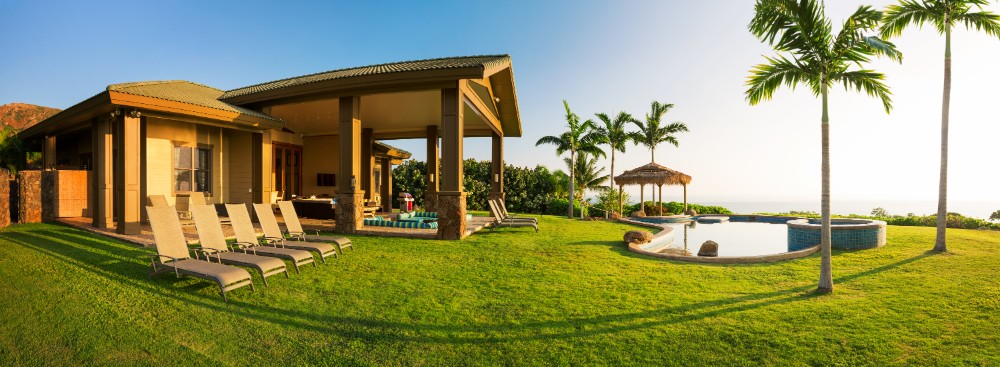 Home with large green lawn