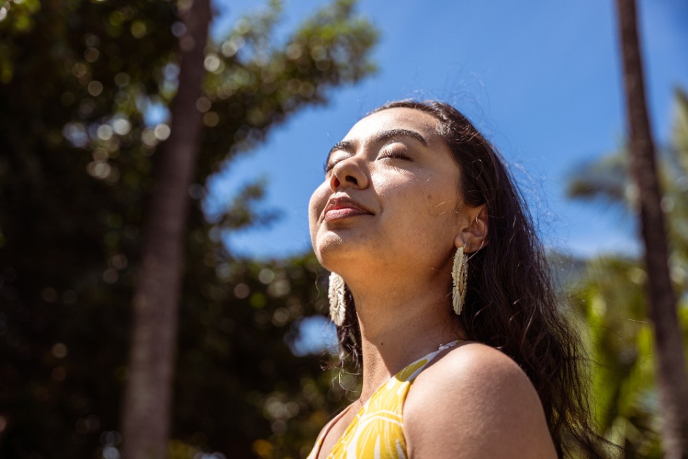 young-pacific-islander-woman-relaxing-in-nature